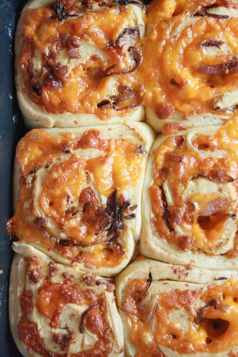 Soft and fluffy savoury rolls filled with orange cheddar and caramelised onions! Savory Brioche Rolls, Recipes Using Lots Of Onions, Carmelized Onion Bread, What To Do With Extra Onions, Bakery Lunch Ideas, Savory Madelines, Carmalized Onion Recipes, Savory Breakfast Rolls, Melty Mashups