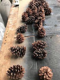 Clover House: Holiday Ombre Pinecone Wreath Pine Cone Wreath Diy, Painting Pine Cones, Pine Cones Diy, Pine Cone Flower Wreath, Deco Mesh Garland, Cones Diy, Pine Cone Wreath, Make Your Own Wreath, Cone Wreath