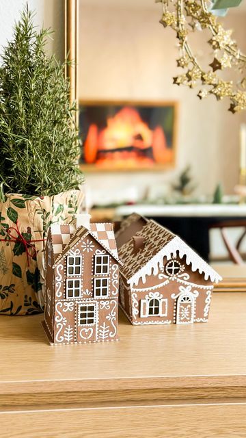 tina le mac 🌙 | DIY + home on Instagram: "Run to Michaels because these wooden houses are back and on sale! I love that these light up and you can paint them however you want, but this gingerbread style is so classic. And if you want it to look realistic, baking soda + paint is the way to go for that perfect cookie texture!🎄🎀❄️

Materials
✔️ Acrylic paint - Sable Brown by Americana
✔️ Baking soda
✔️ White Puffy Paint - Tulip" Sabrina Carpenter White, Work Cubicle Decor, Painted Gingerbread, Gingerbread House Craft, Ginger Bread House Diy, Christmas Party Planning, Gingerbread Diy, Gingerbread House Decorations, Gingerbread Decorations