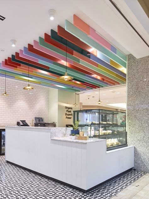 Natural Light Ceiling, Colorful Lobby Interior Design, Inspirational Interior Design, Colorful Ceiling Design, Interior Design Commercial Spaces, Colorful Retail Design, Retail Ceiling Design, Colourful Office Interior, Paint Shop Interior Design