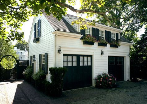 Browse the exterior images of Village Cottage located in historic Edgartown, Martha's Vineyard. The property includes the main home, a detached carriage house, and extensive outdoor living spaces including a pool area and pool cabana. Black Garage Doors, Patrick Ahearn Architect, Patrick Ahearn, Black Garage, Carriage House Garage, Garage Guest House, Loft Plan, Black Shutters, Carriage Doors