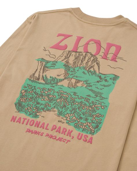 Stay connected to the beauty of Zion National Park and relive its iconic moments with your new go-to long sleeve.A light puff print graphic is featured on both the front and back of the tee, adding a touch of style that's perfect for any adventure. Mens Climbing Style, National Park Merch, National Parks Shirt, Climbing Fits, National Park Clothing, Adventure Shirt Design, National Park Tshirt, National Park Illustration, National Park Shirts