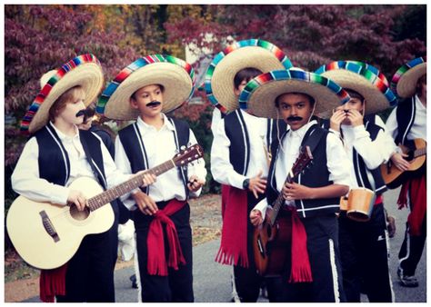 Go in on a group costume: Dressing up can be much more fun when done together. Doesn’t this mariachi band look like a scene from a Wes Anderson film? We especially like the substantial fake mustaches and real guitars. Homemade Group Halloween Costumes, 101 Dalmations Costume, Mariachi Costume, Day Of Dead Costume, Costumes Homemade, Zombie Couple Costume, Zombie Costumes, Painting Tattoos, Fake Mustaches