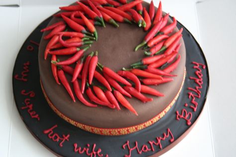 Here’s how the cake looked with the chillies thrown on… The cake itself was a rich chocolate cake filled with chilli chocolate ganache. The chillies were handcrafted from marzipan and p… Chilli Chocolate, Chocolate Pictures, Beach Cakes, Rich Chocolate Cake, 50th Birthday Cake, Types Of Cakes, Cake Boss, Themed Cupcakes, Novelty Cakes