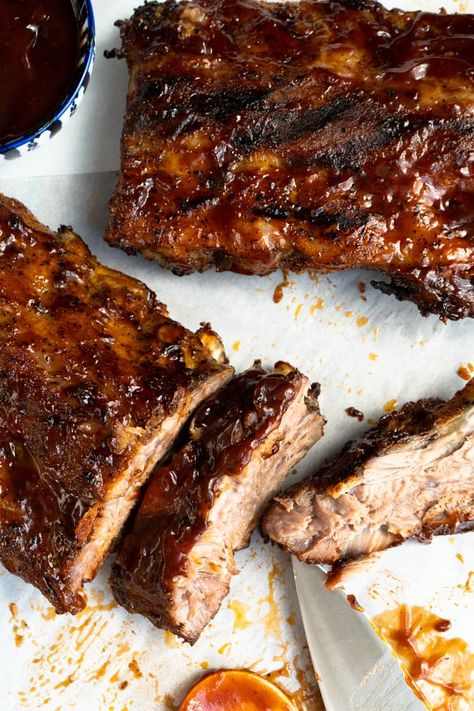 These Fall Off The Bone Baby Back Ribs are the best ever! Marinated for 8 hours in a to die for the dry rub and then slow-roasted in the oven for 3-4 hours. #falloffthebonebabybackribs #bbqbabybackribs #babybackribsintheoven #besteverribs #besteerribsintheoven Fall Off The Bone Baby Back Ribs In Oven, Marinate For Ribs, Beef Ribs In Oven, Slow Cooked Oven Ribs, Ribs Marinade, Oven Baked Beef Ribs, Back Ribs In Oven, Baked Beef Ribs, Babyback Ribs