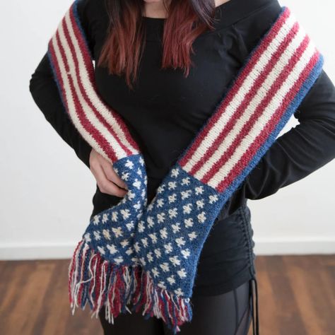 Show off your patriotic style with this knitted cool weather gear. Find these items and more in our American Flag collection: https://bit.ly/NASflaggear #americanflag #coolweather #knittedgifts #mittens #scarves #hats American Flag Scarf, Patriotic Fashion, Scarf With Fringe, Betsy Ross, Scarf Handmade, Fringe Scarf, Knitting Gift, National Flag, Hat Band