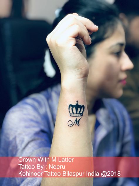 Crown with m Latter Tattoo Wrist Tattoos Words, Tattoo Words, Side Wrist Tattoos, Crown Tattoo, Word Tattoos, Tattoo Designs For Women, Tattoo Lettering, Wrist Tattoos, Jesus Fish Tattoo