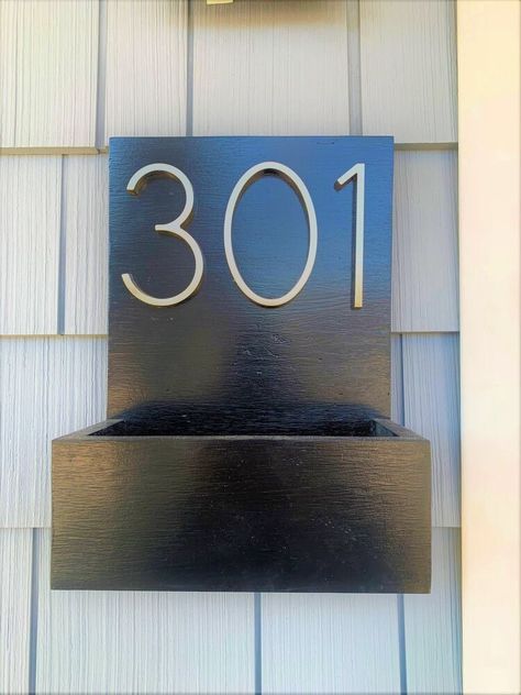 Easy dIy modern house number sign with a box you can use as a planter or mailbox. We have yet to replace our house number sign since we renovated 8 years ago. It’s about time to stop driving our guest crazy looking for our house and finally make it easier for them.I spotted array of awesome house number planter boxes on pinterest and immediately fell in love with the idea. My son Kyle also liked the looks of this sign and wanted to take on this project. I said go for it! Let’s g House Number With Planter, House Number Sign Diy, House Number Diy, House Number Planter, House Flipping Ideas, Modern House Number Sign, Installing Exterior Door, Chalk Paint Chairs, Boys Room Diy