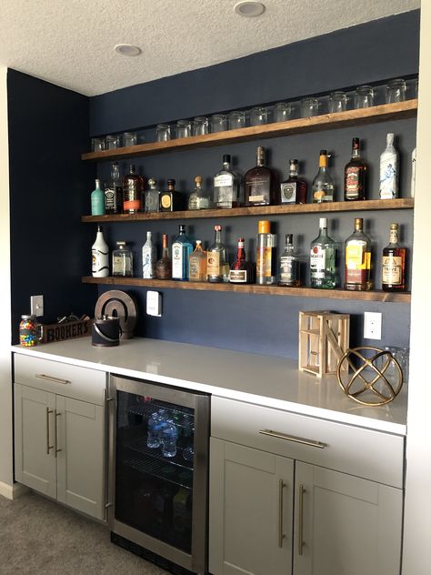 Built in dry bar with floating shelves Dry Bar Liquor Display, I’m Home Bar Ideas, Dry Bar On Carpet, Built In Shelves Bar Area, Dry Bar On Open Wall, Dry Bar Shelves, Entertainment Bar Ideas, Bar Cabinet With Floating Shelves, Built In Bar Shelves