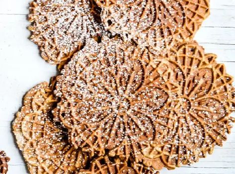 Gingerbread Pizzelle - everybodylovesitalian.com Peanut Butter Pizzelle Recipe, Gluten Free Pizzelle Recipe, Chocolate Pizzelle Recipe, French Christmas Traditions, Traditional Christmas Cake, Pizzelle Cookies, Pizzelle Recipe, Gold Rum, Xmas Cookies