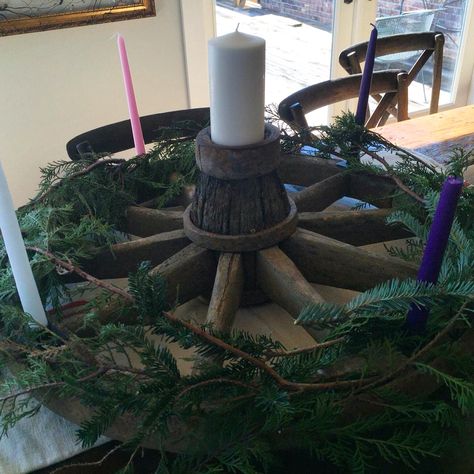 Our antique wagon wheel makes a lovely advent wreath! On a grain sack runner... Antique Wagon Wheels, Antique Wagon, Decorating With Antiques, Boutique Decor, Advent Wreath, Grain Sack, Wagon Wheel, Unique Antiques, Weihnachten Dekoration