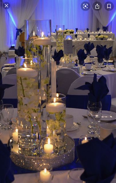 Blue Royal Wedding Decoration, Royal Blue Floating Candles, Royal Themed Wedding Decor, Blue And Gold Flower Centerpieces, Royal Blue Centerpieces Party, Quince Centerpieces Blue, Royal Blue And Silver Wedding Decor, Royal Blue Quince Table Decor, Navy Blue Quince Centerpieces