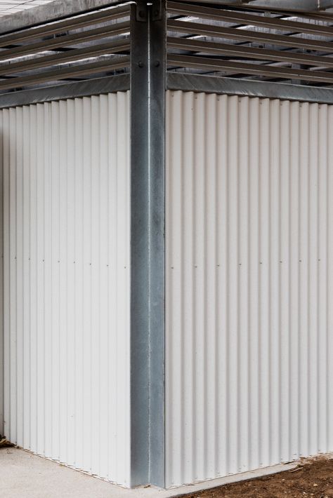 The small public toilet is located in the town of Corowa, NSW. It is built in a flood plain from robust materials including galvanised steel, spotted gum timber, surfmist colorbond walls, laminex blue olympia interior panels with an opaque roof. Physio Logo, Park Amenities, Public Toilet, Small Sheds, Steel Detail, Shed Homes, Corrugated Metal, In The Town, Architecture Rendering