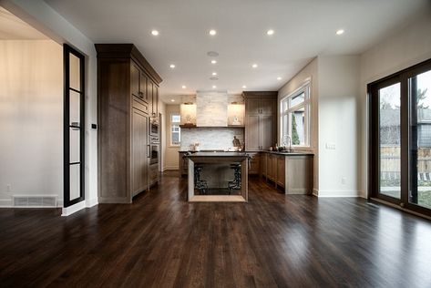 This kitchen features a great layout and a fresh design This is a great alternative if you're tired of painted kitchen cabinets Kitchen Island Dimensions, Powder Room Paint Colors, Kitchen Trends 2020, Top Kitchen Trends, Beveled Subway Tile, Mudroom Flooring, Dining Room Paint Colors, Dining Room Paint, New Kitchen Designs