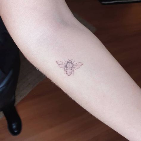 Fine line bee tattoo on the inner forearm. Bee Tattoo Fine Line, Line Bee Tattoo, Fine Line Bee Tattoo, Honey Bee Tattoo, Tattoo Fine Line, Inner Forearm, Petite Tattoos, Bee Tattoo, Tattoo Needles