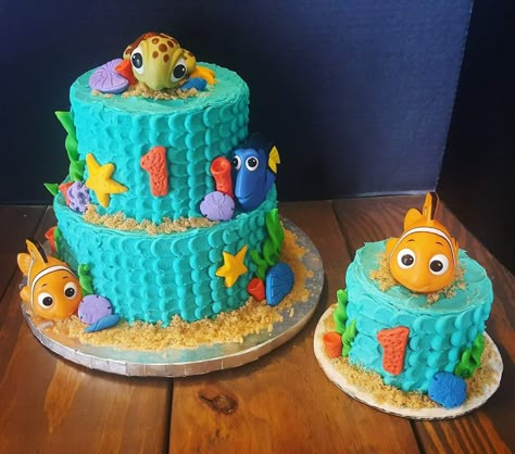 Finding Nemo Smash Cake First Birthdays, Nemo Cupcake Cake, Dory Cake Ideas, Finding Nemo 1st Birthday Cake, Finding Nemo Pool Party, Nemo Themed Party, Nemo Themed First Birthday, Nemo Smash Cake First Birthdays, Finding Dory First Birthday