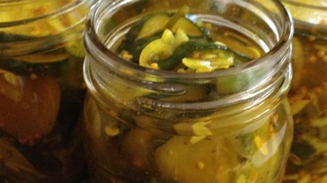 Cucumber slices, onions, peppers and garlic are pickled in an exciting spicy cider vinegar mixture! What a great way to end the summer! Bread N Butter Pickle Recipe, Making Pickles, Cucumber Pickles, Homemade Pickles Dill, Sour Pickles, Pickled Cucumbers, Lime Pickles, Best Pickles, Pickles Recipe