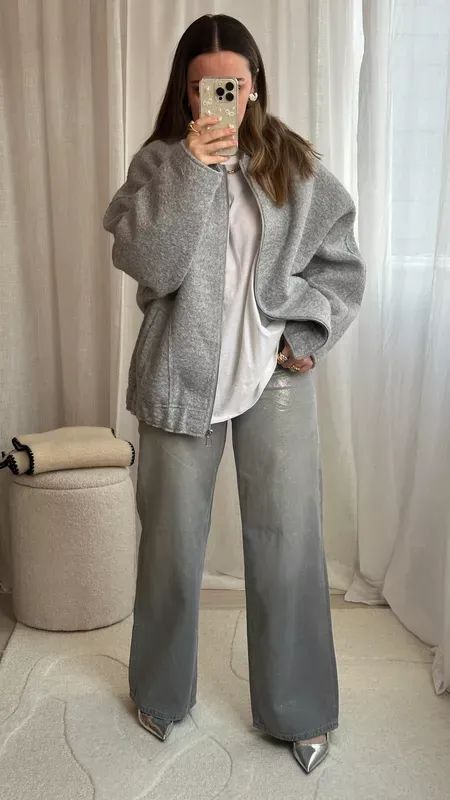 All about the greys and silvers for the winter days 🤍🖤 Grey wool coat | Borg oversized bomber jacket || Heart earrings | Bow phone case | Monica Vinader rings | Winter outfit ideas | Silver coated jeans | All grey outfit idea #LTKover40 #LTKstyletip #LTKworkwear Trousers Outfit Winter, All Grey Outfit, Grey Jacket Outfit, Grey Jeans Outfit, Silver Trousers, Wide Leg Trousers Outfit, Grey Outfits, Grey Wool Coat, Bow Phone Case