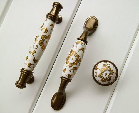 3.75" White ceramic drawer handle pull yellow gold flower dresser knob porcelain wardrobe pull brass cabinet door handle ornate handle 96mm*Specification of the item*A-knob- Material: Zinc alloy, ceramic- Diameter: 33mm （1.3“）- Height: 32mm （1.25”）- Weight: 45gB-Longer handle - Material: zinc alloy, ceramic- Length: 145mm （5.7“）- Holes center to center: 96mm （3.75“）- Height: 38mm （1.5”）- Weight: 95gC-Shorter handle - Material: zinc alloy, ceramic- Length: 120mm （4.7）- Holes center to center: 96m Gold Cabinet Pulls, Antique Drawer Pulls, Wood Drawer Pulls, Dresser Knob, Ceramic Door Knobs, Vintage Knobs, Charleston Homes, Brass Cabinet, Cabinet Door Handles