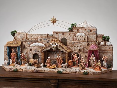 Our 2022 Countdown to Christmas continues with Fontanini! The Nativity Village Display pairs with the 5 Inch Fontanini Collection of figures. Design your own scene to celebrate the season with a wide variety of figures, stables, and village and set pieces with new introductions to the Fontanini line every year! Roman is proud to be the exclusive distributor for Fontanini Heirloom Nativities since 1973, bringing the much sought-after collection to its devoted fans here in the United States. Christmas Nativity Scene Display, Christmas Crib Ideas, Nativity Scene Display, Fontanini Nativity, Nativity Figures, Diy Nativity, Scale Figures, Village Display, Cardboard House