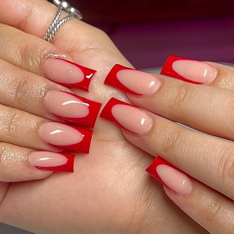 Below is our selection of the prettiest design ideas for red French tip nails - if you want to try a new twist on this manicure classic, we are sure you will lots of beautiful manicure ideas in this article. French tip nails | Red french tip nails | French manicure | Red nails | Red nail design | elegant nail designs | nail trends 2023 Nail Ideas For 2023, Red French Tip Nails, Red Tip Nails, Almond Nails Red, Short Red Nails, Red French Tip, Christmas Nail Ideas, French Manicures, Tapered Square Nails