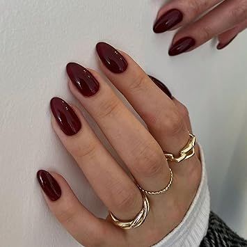 Get a sophisticated look with these 24pcs short almond press-on nails in a stunning burgundy wine red! Perfectly shaped for a natural almond or oval finish, these nails are easy to apply and designed for a secure fit. Ideal for a bold, elegant manicure anytime. #BurgundyNails #WineRedNails #PressOnNails #AlmondNails #NailArt Medium Almond Nails, Glue On Nails Short, Round Shaped Nails, Red Press On Nails, Nails Short Almond, Nails Medium Almond, Acrylic Gel Nails, Natural Acrylic, Nails Oval