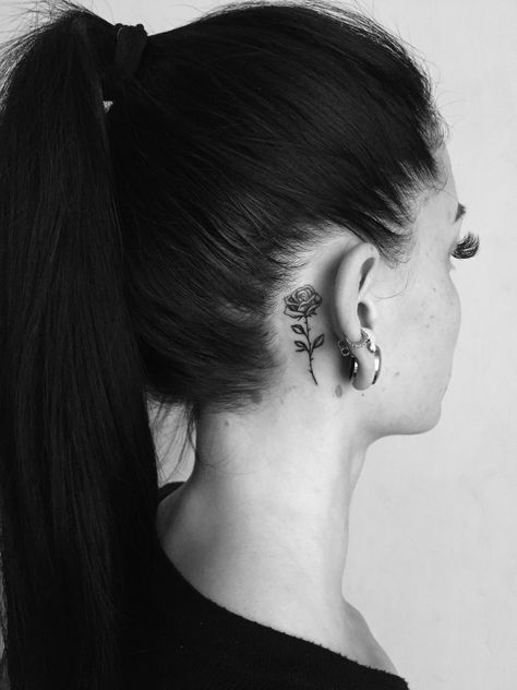 Rose Tattoo On Ear, Rose Tattoo Design Behind Ear, Small Red Rose Tattoo Behind Ear, Roses Behind Ear Tattoo, Black Rose Tattoo Behind Ear, Below The Ear Tattoo, Floral Tattoo Behind Ear, Female Behind Ear Tattoo, Rose Tattoo Behind Ear Men