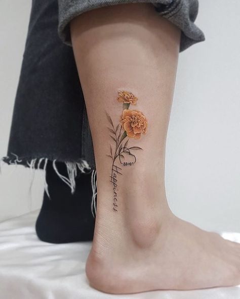 Marigold Flower Tattoo With Name, Marigold With Name Tattoo, Marigold Tattoo With Name, Carnation Forearm Tattoo Women, Tattoo Words And Flowers, Como La Flor Tattoo, Marigold Wrist Tattoo, Tattoo Carnation Flower, Birth Tattoo Ideas Baby