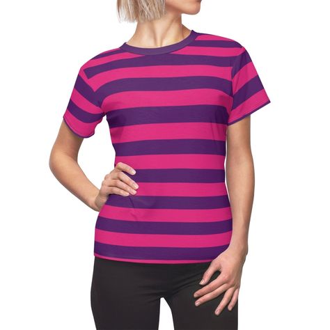 Our designer Pink and Purple Striped women's t-shirt is meticulously crafted to elevate your casual style. Experience the perfect blend of cool and comfort with its uniquely textured, microfiber-knit fabric and exclusive graphic design. Our premium features such as the ribbed crewneck, shoulder tape, and reinforced sides guarantee its shape and design longevity.  Choose between lightweight (4oz) or heavyweight (6oz) breathable fabric options, tailored for your preferred fit in summer and spring, or fall and winter seasons. FEATURES: - 100% Polyester: This extremely strong and durable synthetic fabric retains its shape and dries quickly - Two breathable fabric options:  a) Lightweight: 4oz fabric (4.0 oz/yd² (113 g/m  b) Heavyweight: 6oz fabric (6.0 oz/yd² (170 g/m - Regular fit - Side seam Pink And Purple Striped Shirt, Pink Ladies Outfit, Graphic Aesthetic, Pink Striped Shirt, Women Tshirt, Girls Stripes, Purple Shirt, Fashion Fits, Vintage Designer