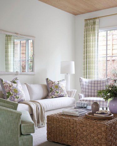 Here are 11 great color pairings to consider with purple and green. #hunkerhome #homedecor #homedecorideas #homedecorinspo Green And Purple Apartment, Green And Purple Home Decor, Lilac Apartment, Purple Green Room, Green And Purple Living Room, Purple And Green Room, Purple And Green Bedroom, Woven Ottoman, Vintage Inspired Bedroom