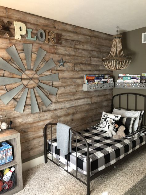 Farmhouse style kid’s room. Wood accent wall, metal bed, Beddy’s gingham bedding, beaded chandelier, and Magnolia windmill create a fun, yet neutral look for a little boy’s bedroom. #boyroom #bedroomdecor #boys  #kidsroom #kidsroomsdecor #kidsroomideas #farmhousedecor #farmhousestyle #woodwall #beadedchandelier #beddys #windmill Boys Farm Bedroom, Farm Boy Room, Farmhouse Kids Room, Rustic Boys Bedrooms, Farmhouse Kids Bedroom, Farm Bedroom, Farm Room, Sister Room, Western Bedroom Decor