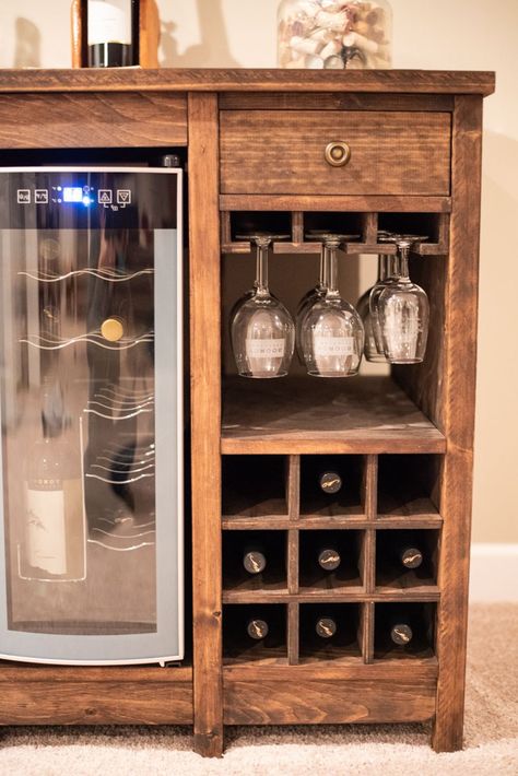 This DIY wine cabinet can hold up to 30 bottles of wine and is the perfect piece of furniture for any wine lover out there. #winecabinet #diywinecabinet #diyfurniture #diyplans #winelover | www.chiselandfork.com Wine Cooler Cabinet Ideas Diy, Mini Wine Fridge Cabinet, Wine Cabinet With Refrigerator, Diy Wine Cabinet Ideas, Small Wine Bar Ideas, Bar Cabinet Ideas Diy, Wine Cooler Cabinet Ideas, Cabinet With Wine Fridge, Wine Fridge Ideas