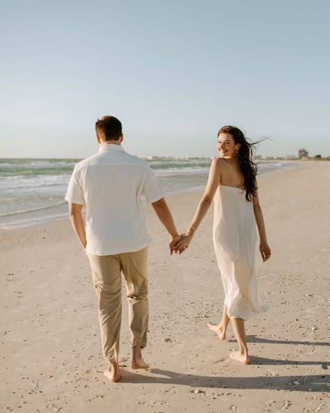 A very windy day turned into one of my fave engagement shoots 💍🌬️ Eric + Abby have the sweetest love and I am so happy I got to document this time for them!! Also isn’t her dress incredible!? There’s something about simplicity that is so elegant!! ✨ [beach engagement, engagement photos, St Pete beach photographer, st Pete photographer, Florida wedding photographer, beach engagement photos, documentary style photos, documentary photography] Tripod Beach Pictures, Maui Engagement Photos, Fun Beach Engagement Photos, Casual Beach Engagement Photos, Lakeside Photoshoot, Cabo Pictures, Bali Photoshoot, Beach Engagement Photos Outfit, Engagement Photos On The Beach