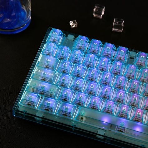 【Unique Transparent Design】Pursuing ultimate transparency, the X75 takes a high-quality transparent polycarbonate keyboard top and buttom case, clear keycaps, and transparent crystal switches. The keycaps is High-Quality Transparent PC Material with UV Printing Keycaps.The whole body is transparent, making the RGB lighting more gorgeous, creating a visible environment even under dark conditions. Keyboard Dark, Transparent Keyboard, Unique Keyboards, Wireless Lights, Gaming Stuff, Gaming Keyboard, Transparent Design, Mechanical Keyboard, Gaming Setup