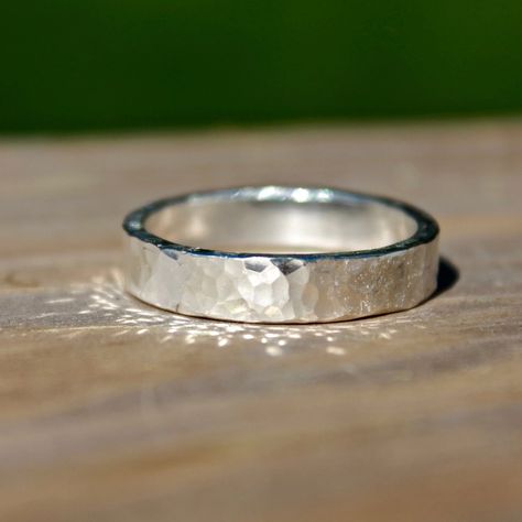 These Hammered bands in silver are perfect for Wedding bands or everyday wear. Great for Men and Women, these bands are handmade to order in your size using traditional metal smithing techniques. I have given the ring a lightly hammered textured finish for a classic yet rustic look with a high shine finish. Measures: 5mm Photos show High Shine and three rings to show how each ring is a little unique! Material: Silver (.925). All materials are hypoallergenic. These Rings are designed and handcraf Hammered Man Ring, Silver Rings For Women Band, Hammered Silver Ring Men, Men's Rings Silver, Hammered Metal Rings, Hammered Silver Wedding Band, Silver Men Wedding Ring, Silver Ring Design For Men Unique, Metal Rings For Men