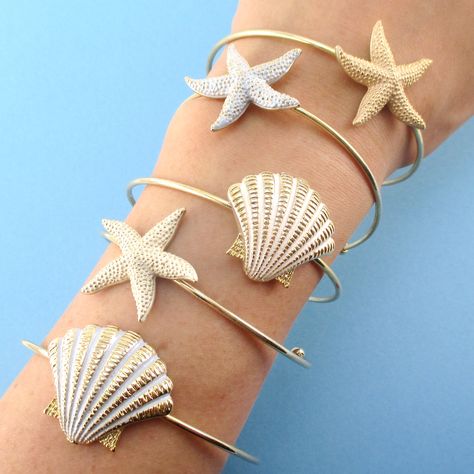 Channel your inner mermaid/ sea goddess with these beautiful sea inspired bangles!!!  Shop Online Today! 🌟🐚🐟  - -  #mermaidjewelry #bangles #seashellbracelet  #starfishbangle #starfishbracelet #mermaidbangle #oceanbangle #oceanbracelet #animaljewelry #dotoly #islandvibes Coastal Bracelet, Bangles Shop, Gold Bangle Bracelets, Bracelet Cuffs, Mermaid Accessories, Ocean Bracelet, Sea Goddess, Seashell Bracelet, Mermaid Bracelet