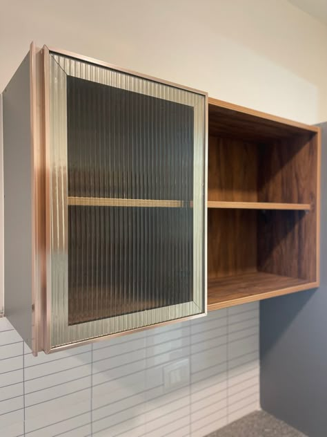 Louvered glass’s profile shutters with fluted glass Kitchen Profile Glass Design, Glass Shutters For Cabinets, Profile Doors Kitchen, Glass Shutter Kitchen, Profile Shutter Kitchen, Profile Shutter Wardrobe, Profile Shutter Glass Design, Fluted Glass Kitchen Cabinets, Glass Profile Shutter Kitchen