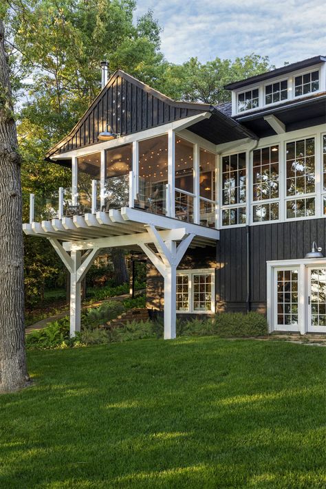 Moonlight Cottage | Murphy & Co Design Cozy Lake House, Custom Wood Garage Doors, Scandinavian Cottage, Stone Chimney, Wood Garage Doors, Timber Ceiling, Scandinavian Wallpaper, Screen Porch, Vintage Light Fixtures