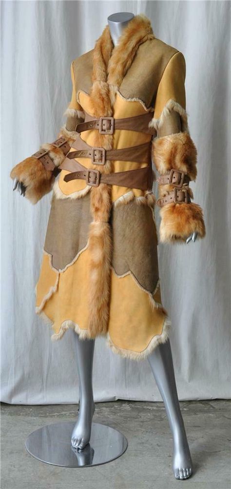 Stunningly beautiful shearling/fur coat - so ultra warm and deluxe! The buckles are absolutely gorgeous and lend so much style to this patchwork coat - retails for $5,000.00. Designer: Voyage Condition: New without tags; the care label states that the hide naturally has imperfections in the leather and that even with premium hides this is the case. We think it only adds to the character of the coat anyway - it looks gorgeous! Color: Brown, Tan, Light Golden Pumpkin and Dark Honey Content: Shearling Leather/Fur - we're uncertain what kind of fur the longer one is - but it's soft and has a beautiful wave to it. Unlined, but is soft shearling and fur on the inside Designer Size: Marked US 10, IT 44, FR 40, but best for a US 4/6. Made in: Italy Measurements (taken with garment lying flat): Che Fur Runway, Patchwork Coat, Inuit Art, Long Coat Jacket, Funky Outfits, Fantasy Story, Medieval Clothing, Alternative Outfits, Fur Fashion