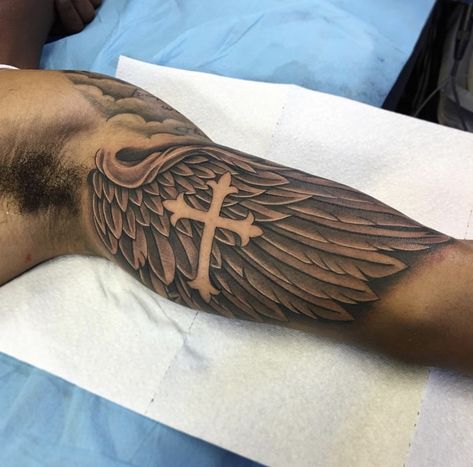 Bicep Wing Tattoo Men, Half Bicep Tattoo, Left Arm Tattoos Men, Tattoos On Biceps For Men, Bicep Half Sleeve Tattoo Men, Male Inner Bicep Tattoo, God Theme Tattoo, Mid Arm Tattoo Men, Mens Inside Bicep Tattoo