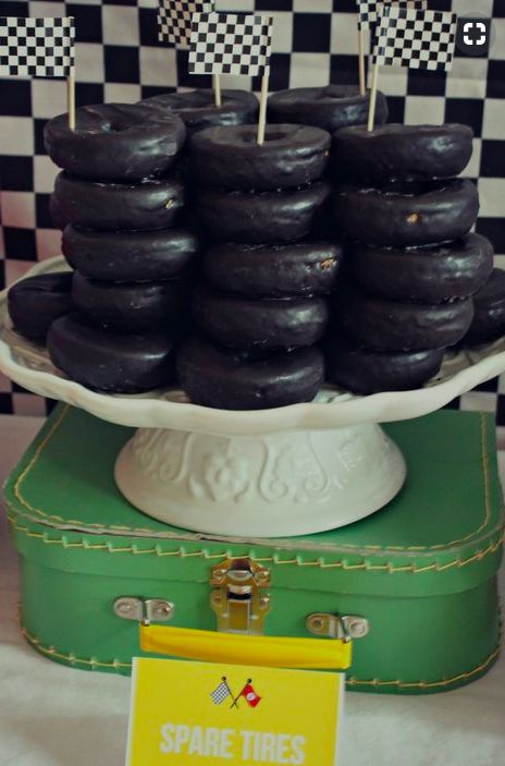 CafeMom.com : Spare tire doughnut cake : 50 Adorable Ideas to Pull Off the Most Popular Baby Shower Themes for Boys -- A transportation-themed baby shower is so much better when you offer guest a sweet spare tire instead of a slice of traditional shower cake. Cake Truck, Hot Wheels Birthday Party, Hot Wheels Themed Birthday Party, Popular Baby Shower Themes, 4de Verjaardag, Hotwheels Birthday Party, Truck Cake, Hot Wheels Party, Hot Wheels Birthday