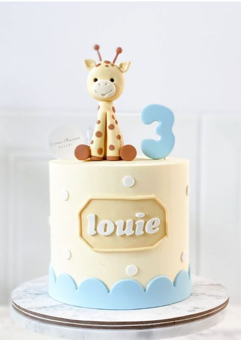 This adorable baby blue fondant wrap buttercream frosted cake features a lovely fondant baby giraffe topper. Giraffe Bento Cake, Giraffe Cake Ideas, Giraffe Smash Cake, Sophie The Giraffe Cake, Giraffe Topper, Fondant Giraffe, Giraffe Cake Topper, Giraffe Baby Shower Cake, One Year Birthday Cake