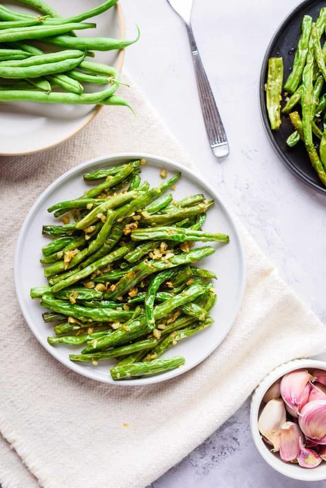 If you're bored of the same old green beans, then this recipe will be your new best friend. Inspired by Din Tai Fung green beans, these smothered garlic green beans are crispy, savory, and addictively delicious! Din Tai Fung Green Beans, Green Beans Vegan, Asian Sides, Kale Recipe, Din Tai Fung, Garlic Green Beans, Ethiopian Food, Kale Recipes, Green Bean Recipes