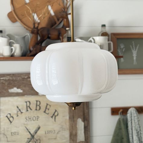 Hands up if you love beautiful design! This Handcrafted Bulbous Milk Glass Pendant is here to steal the spotlight with its timeless elegance and vintage charm. Perfect for creating a warm and inviting glow, this pendant light is a delightful blend of style and craftsmanship. Its milk glass shade, shaped with a bulbous silhouette, brings a soft, diffused light to any room, enhancing your decor with a touch of nostalgia. Handcrafted Quality: Slight variations in shape and finish make each piece tr