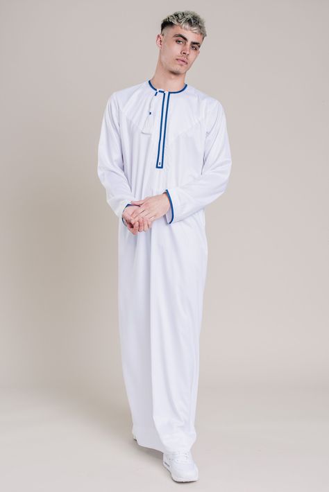 White & Blue Omani With Tassel Small restock in-store only #CaveThobes #Jubbas #Ramadan #Eid #Kandura Jalabia For Men, Kanzu Wear, Jalabiya Dress, Muslim Men Clothing, Faisal Khan, Sweater Outfits Men, Man Clothes, Men's Kurta, Fabric Photography