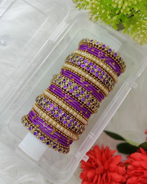 ⚜️ Customized Bridal Bangles for purple silk saree 💜💜 ✨ 𝗖𝗲𝗹𝗲𝗯𝗿𝗮𝘁𝗲 𝘁𝗵𝗲 𝘀𝗽𝗲𝗰𝗶𝗮𝗹 𝗯𝗼𝗻𝗱 𝘄𝗶𝘁𝗵 𝗰𝘂𝘀𝘁𝗼𝗺𝗶𝘇𝗲𝗱 𝘀𝗶𝗹𝗸 𝘁𝗵𝗿𝗲𝗮𝗱 𝗞𝘂𝗻𝗱𝗮𝗻 𝗯𝗮𝗻𝗴𝗹𝗲𝘀, 𝗮 𝘁𝗶𝗺𝗲𝗹𝗲𝘀𝘀 𝗰𝗼𝗻𝗻𝗲𝗰𝘁𝗶𝗼𝗻 𝘄𝗿𝗮𝗽𝗽𝗲𝗱 𝗶𝗻 𝗲𝗹𝗲𝗴𝗮𝗻𝗰𝗲 💖 ✨ 𝗟𝗲𝘁 𝘆𝗼𝘂𝗿 𝘀𝘁𝘆𝗹𝗲 𝗿𝗲𝘀𝗼𝗻𝗮𝘁𝗲 𝘄𝗶𝘁𝗵 𝘆𝗼𝘂𝗿 𝘂𝗻𝗶𝗾𝘂𝗲 𝗯𝗼𝗻𝗱 🌟 𝗦𝗲𝗻𝗱 𝘂𝘀 𝗮 𝗽𝗶𝗰 𝗼𝗳 𝘆𝗼𝘂𝗿 𝘀𝗮𝗿𝗲𝗲 𝗼𝗿 𝗼𝘂𝘁𝗳𝗶𝘁, 𝗮𝗻𝗱 𝘄𝗮𝘁𝗰𝗵 𝘁𝗵𝗲 𝗺𝗮𝗴𝗶𝗰 𝘂𝗻𝗳𝗼𝗹𝗱 𝘄𝗶𝘁𝗵 𝗰𝘂𝘀𝘁𝗼𝗺𝗶𝘇𝗲𝗱 𝗯𝗮𝗻𝗴𝗹𝗲𝘀 𝗳𝗼𝗿 𝘆𝗼𝘂𝗿 𝘀𝗽𝗲𝗰𝗶𝗮𝗹 𝗱𝗮𝘆 ❣️ 𝗥𝗲𝗮𝗱𝘆 𝘁𝗼 𝗺𝗮𝗸𝗲 𝗺𝗲𝗺𝗼𝗿𝗶𝗲𝘀 𝗶𝗻 𝘀𝘁𝘆𝗹𝗲? ✨ 💌 𝗗𝗠 𝗼𝗿 𝗪𝗵𝗮𝘁𝘀𝗔𝗽𝗽 𝘂𝘀 𝘁𝗼 𝗽𝗹𝗮𝗰𝗲 𝘆𝗼𝘂𝗿 𝗼𝗿𝗱𝗲𝗿 𝗮𝗻𝗱 𝗲𝘅𝗽𝗲𝗿𝗶𝗲𝗻𝗰𝗲 𝘁𝗵𝗲 𝗲𝘅𝗰𝗹𝘂𝘀𝗶𝘃𝗲𝗻𝗲𝘀𝘀 𝗼𝗳 𝗠𝗮𝘆𝗮 𝗩𝗲𝗻𝗯𝗮’𝘀 𝗕𝗼𝘂𝘁𝗶𝗾𝘂𝗲 Silk Thread Bangles Design Latest Bridal, Purple Silk Saree, Silk Thread Bangles Design, Thread Bangles Design, Desi Outfits, Kundan Bangles, Silk Thread Bangles, Thread Bangles, Bangles Design