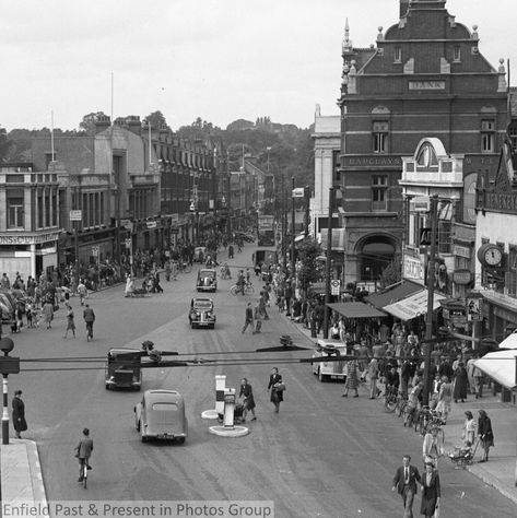 Enfield Town looking West. Based on the cars and people I'd guess early 1950's. Town Pictures, Enfield Town, Historic London, Historical London, Old Lorries, Tottenham Hotspur Fc, London History, London Town, Old London