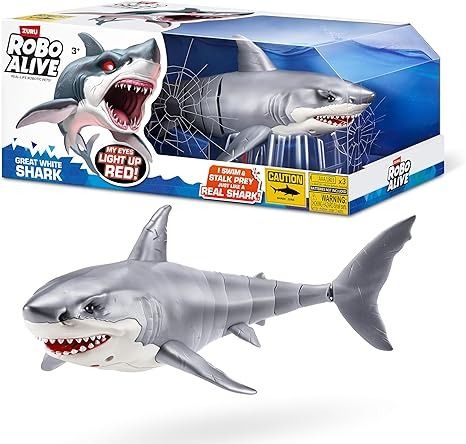 Amazon.com: Robo Alive Great White Shark Series 1 by Zuru, Battery-Powered Robotic Light Up Shark Toy, Summer Pool Toy, Bath Toy : Toys & Games Robo Fish, Shark Toys, Remote Control Robots, Life In Water, Ps4 Controller Custom, Jaws Movie, Animal Birthday Cakes, Kid Gift Ideas, Shark Toy