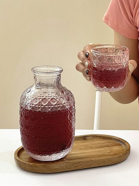 Classic crystal pattern glass carafe set that is perfect for your bedside table or to sip water in style! ✨

• Includes 1x glass jug & 1x glass cup
• Perfect size to put next to your bedside table for a night drink, or next to you as you WFH
• Cup doubles as a lid to save space & to keep your liquids clean
• Perfect as a photography prop
• So pretty when you put juices, infused water or cocktails in! Bedside Water Carafe Aesthetic, Bedside Table Carafe, Ceramic Bedside Carafe, Water Carafe Bedside, Bedside Water Carafe, Bedside Carafe, Carafe Set, Water Carafe, Crystal Pattern