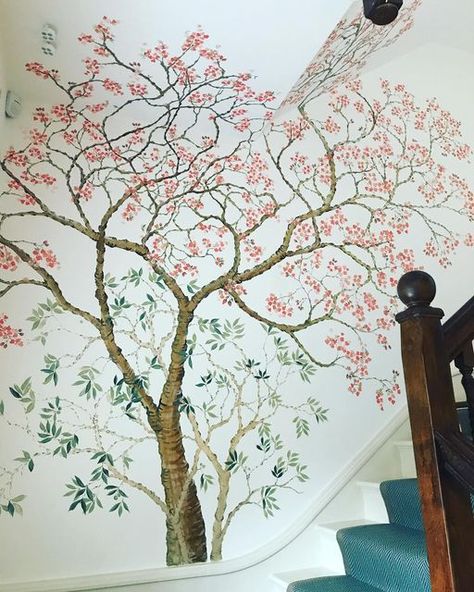 Mural artists on Instagram: "We loved painting this mural in a beautiful house in Highgate. It was the perfect addition to their staircase. In our new book we provide a step by step guide to the painting of this cherry tree, giving you all the information you need to paint this in your own home. Link in bio, preorder still available and out in bookshops next week!" Painted Tree On Wall, Wallpapered Rooms, Stairway Art, Exterior Murals, A Beautiful House, Tree Wall Murals, Tree Mural, Victorian Garden, Dogwood Trees